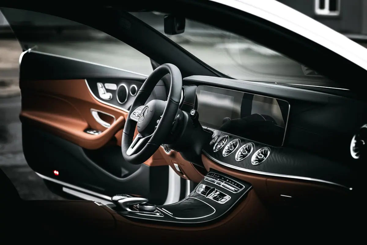 Dark luxury car interior with no chauffeur 