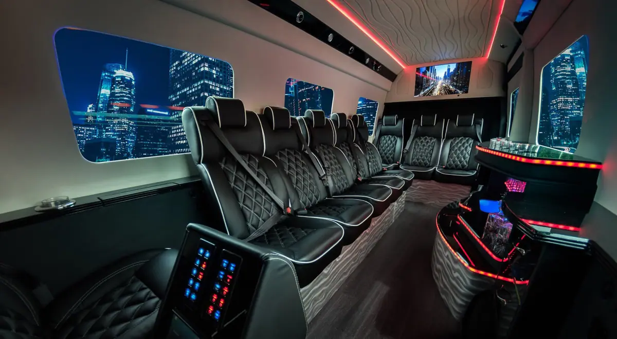 Party bus interior with premium seats and LED lights in L.A by night