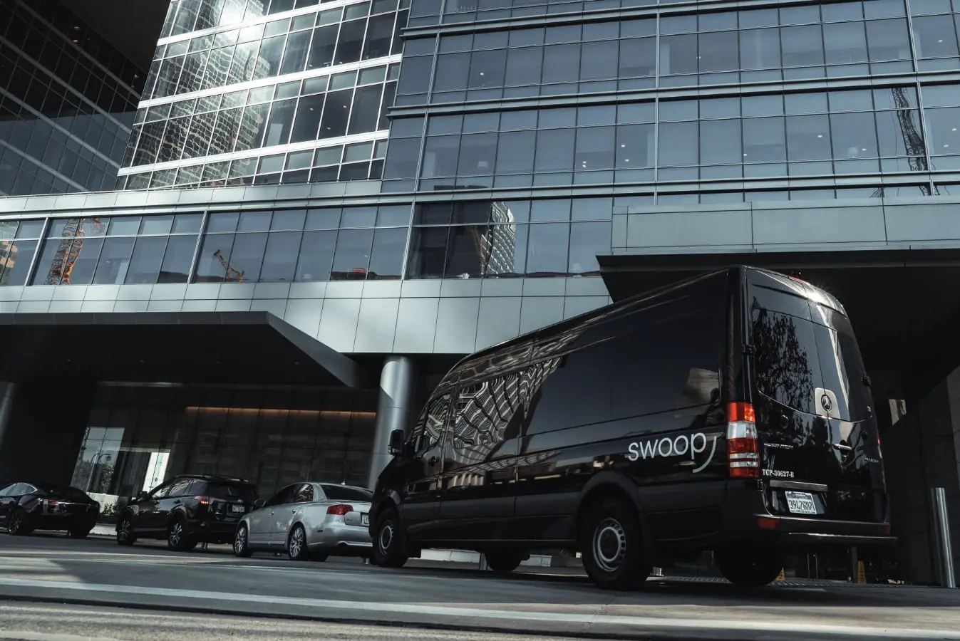 Sprinter van outside of convention center picking up passengers