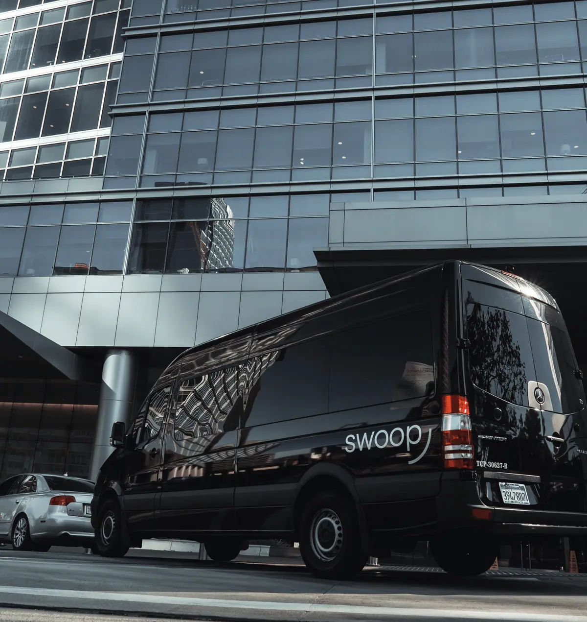 Sprinter Van outside of corporate building