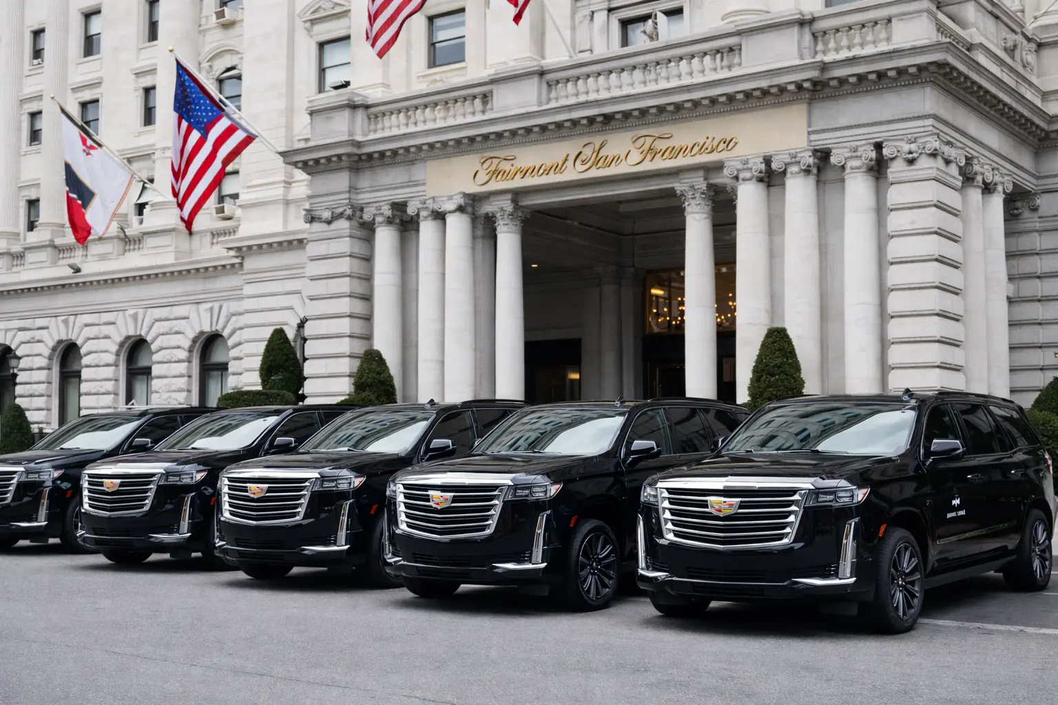 Black Cadillac Escalades lined up outside the Fairmont San Francisco